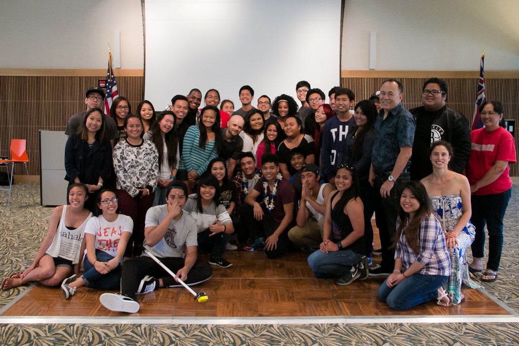 Dominic "D-Trix" Sandoval smiles with UH West Oʻahu students.