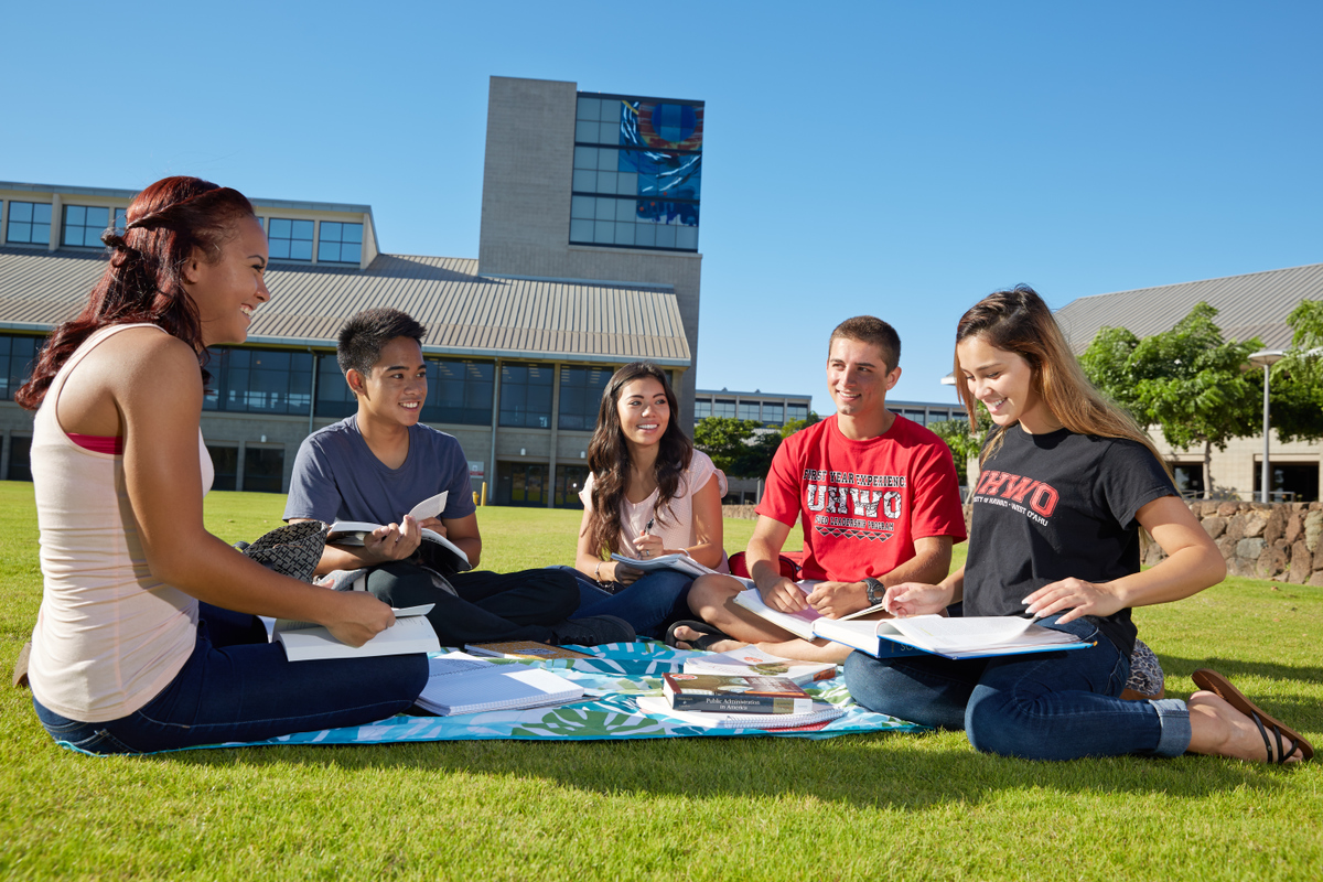 UH West Oʻahu students studying on the Great Lawn.