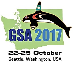 Conference logo showing dates and map of Washington State, killer whale