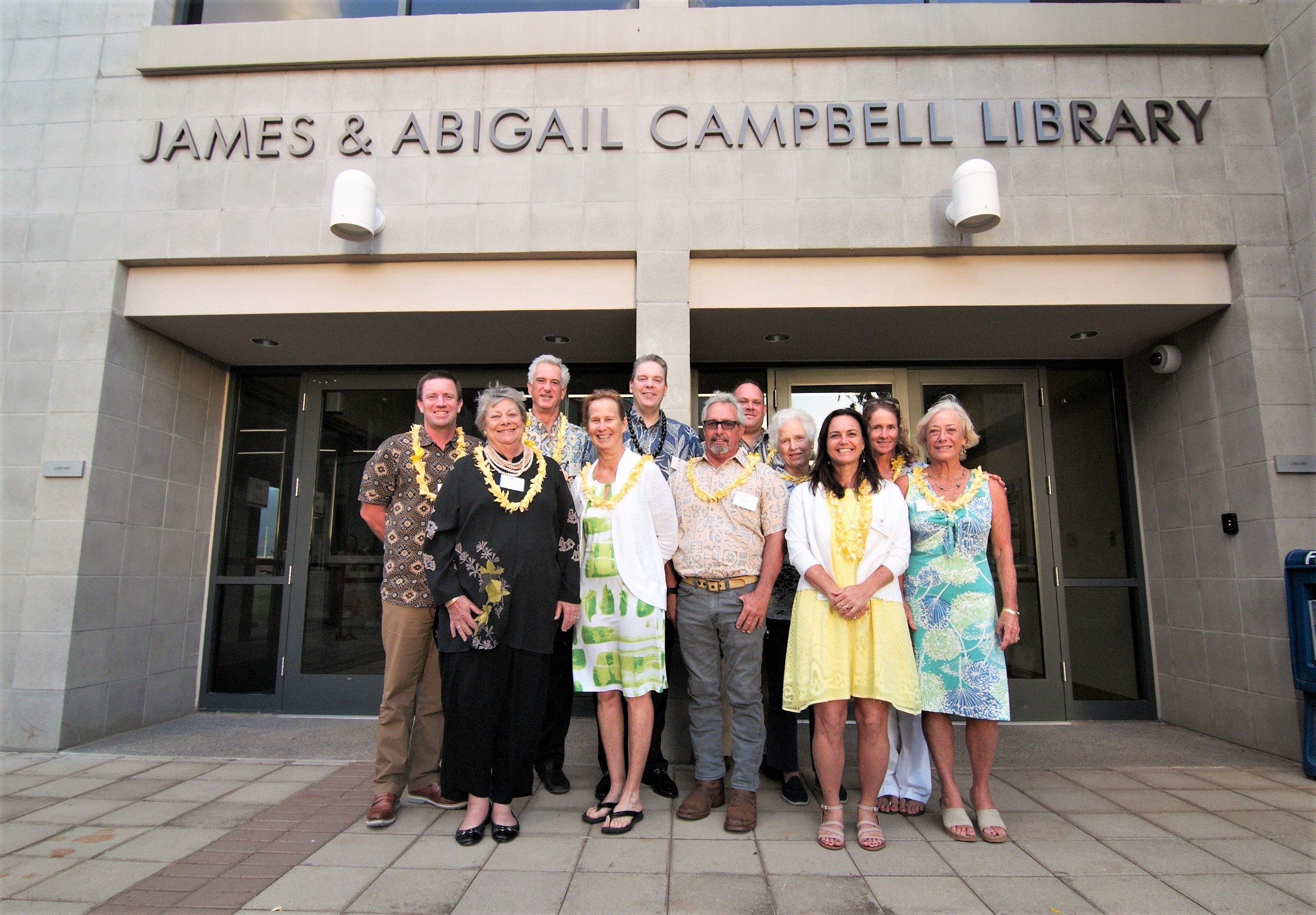 Photo of Members of the Campbell family, the James Campbell Co., and the James and Abigail Campbell Family Foundation attended the library naming event.