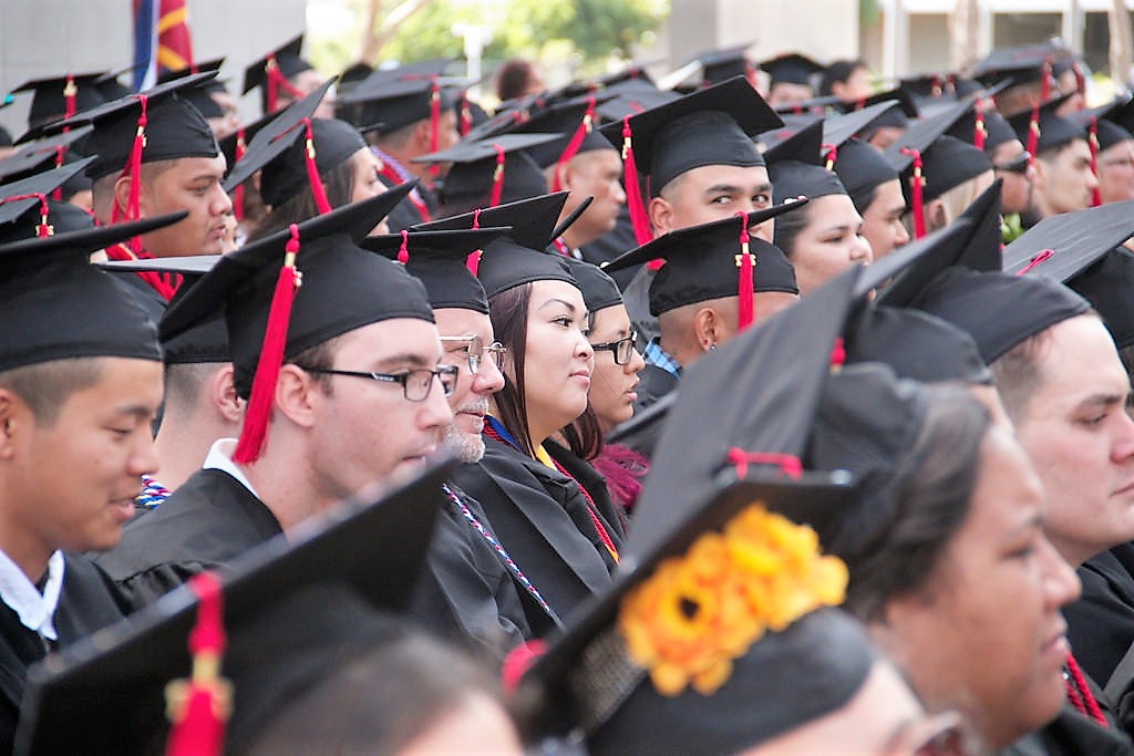 photo of graduates sitting during ceremony