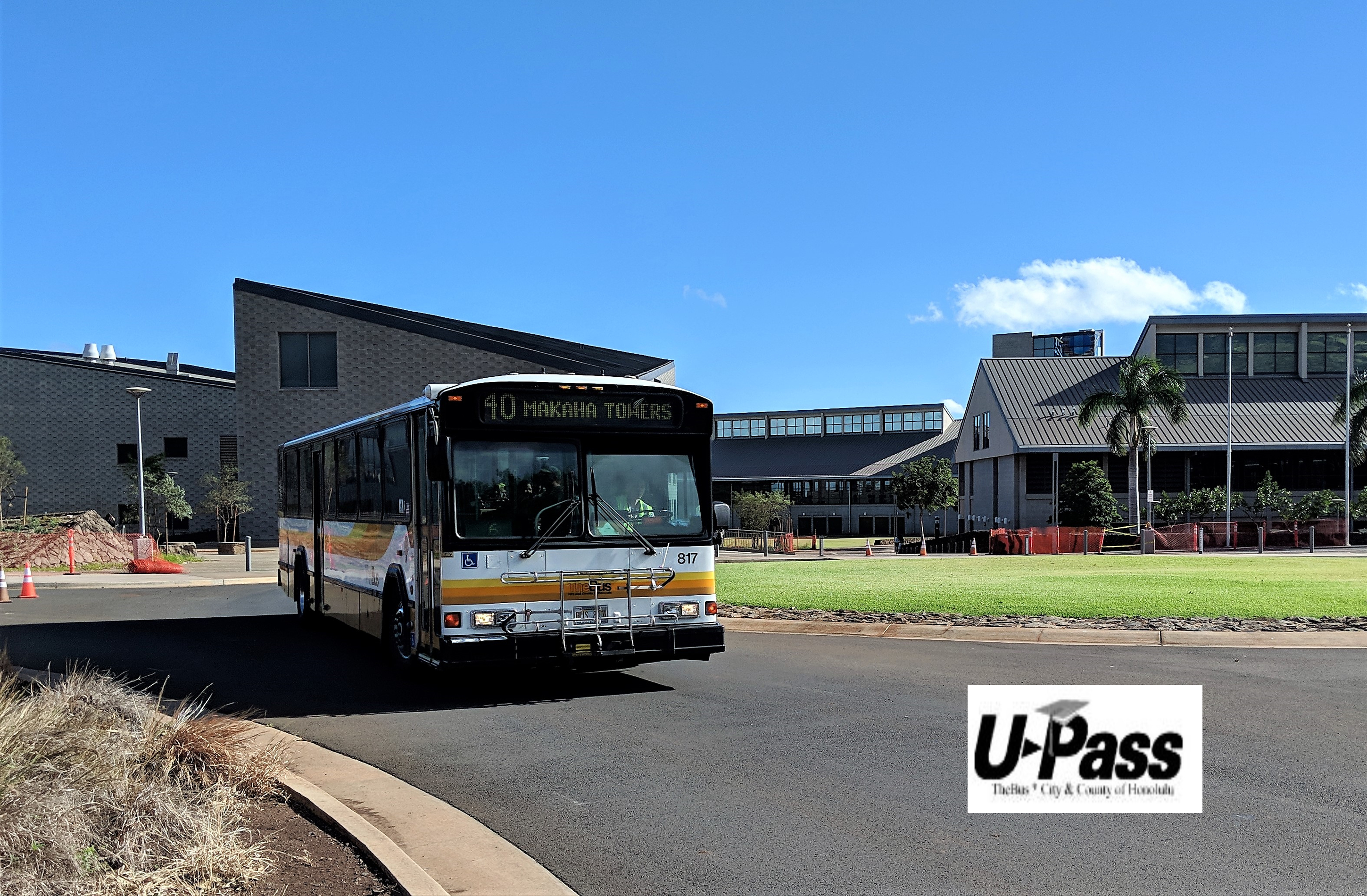 Photo of bus in traffic circle fronting the campus with words U-Pass