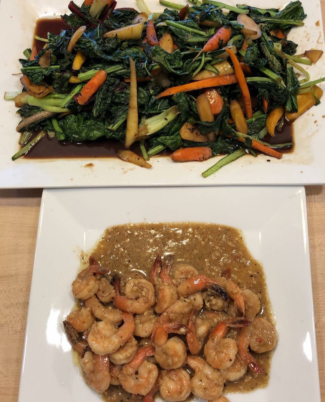 Plate of garlic shrimp and stir fry vegetables