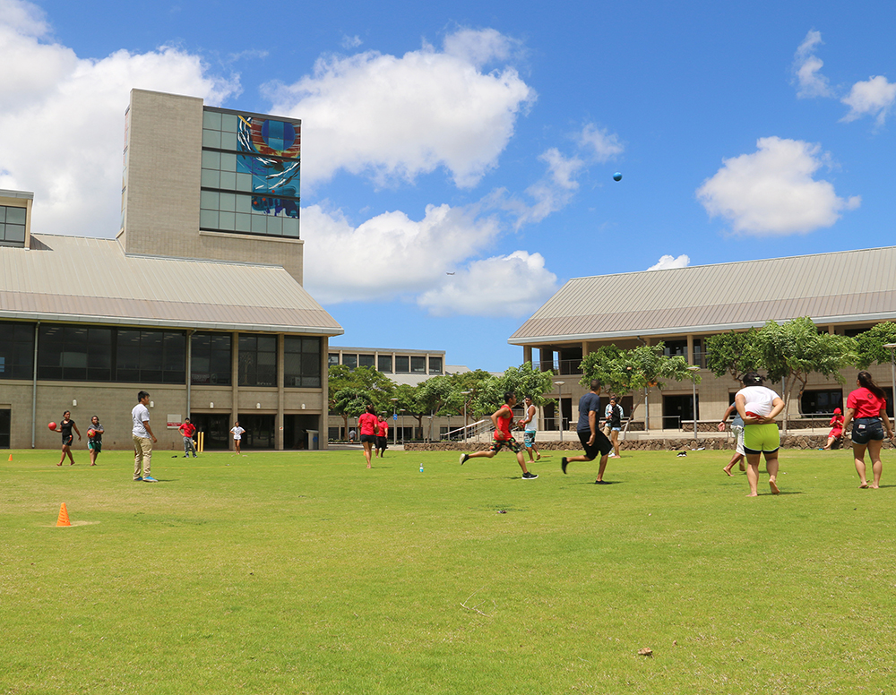 Students playing dodge ball on the UH West Oʻahu Great Lawn.