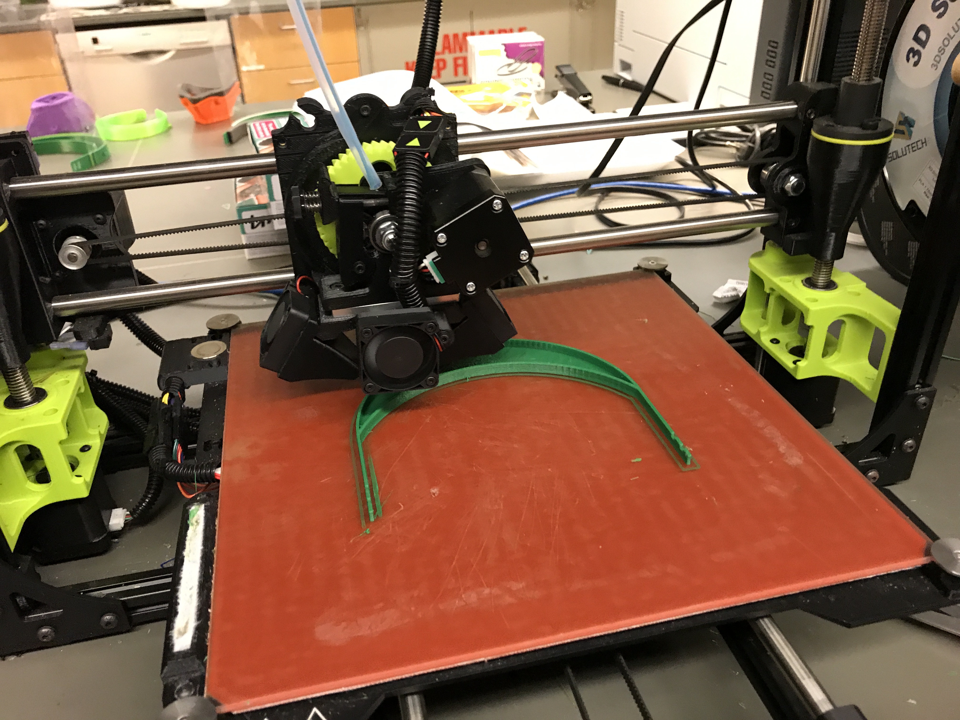 A 3D printer creating a headband.