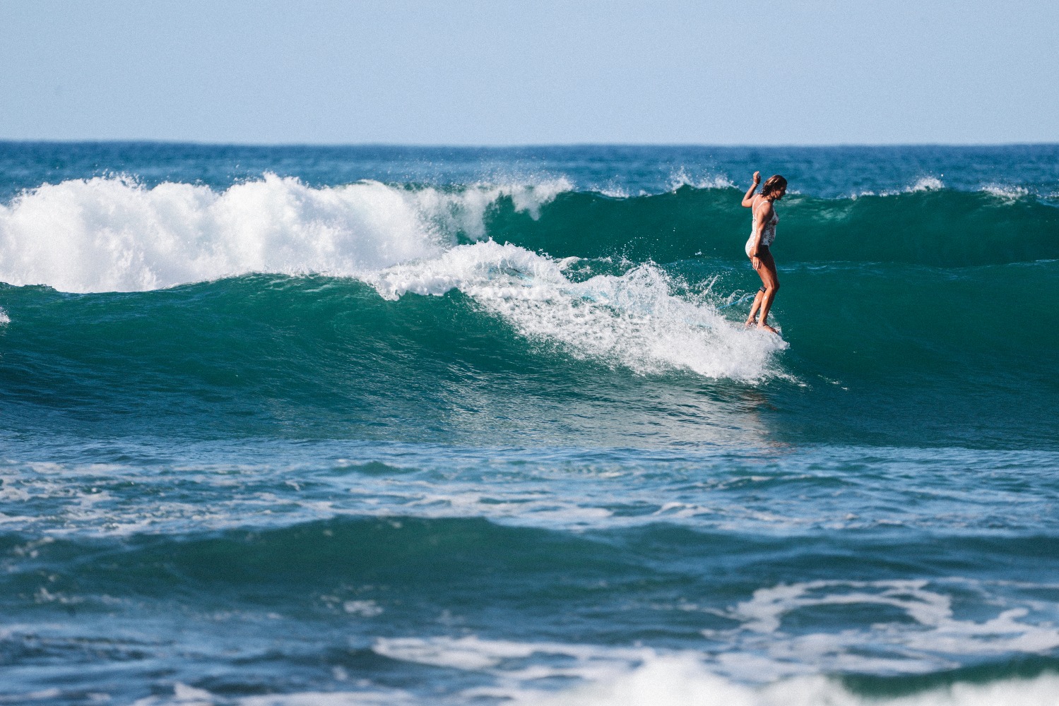 Woman surfing.