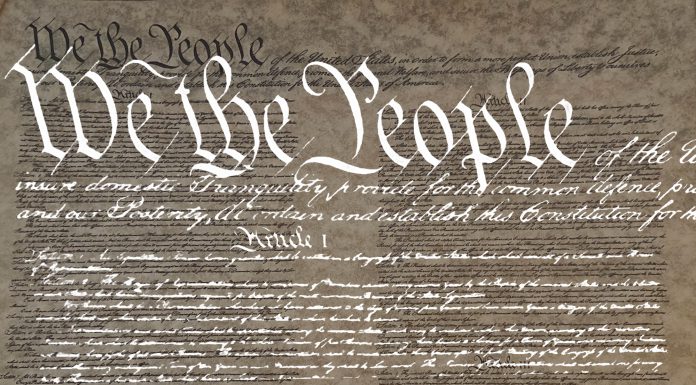 A close-up of the US constitution that begins, 