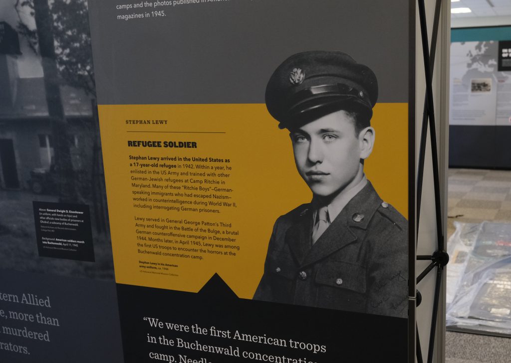 Vertical posters as part of the "Americans and the Holocaust" exhibit.