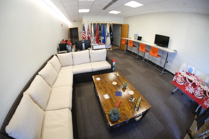 A sofa and coffee table at the UH West Oahu Veterans Center of Excellence.