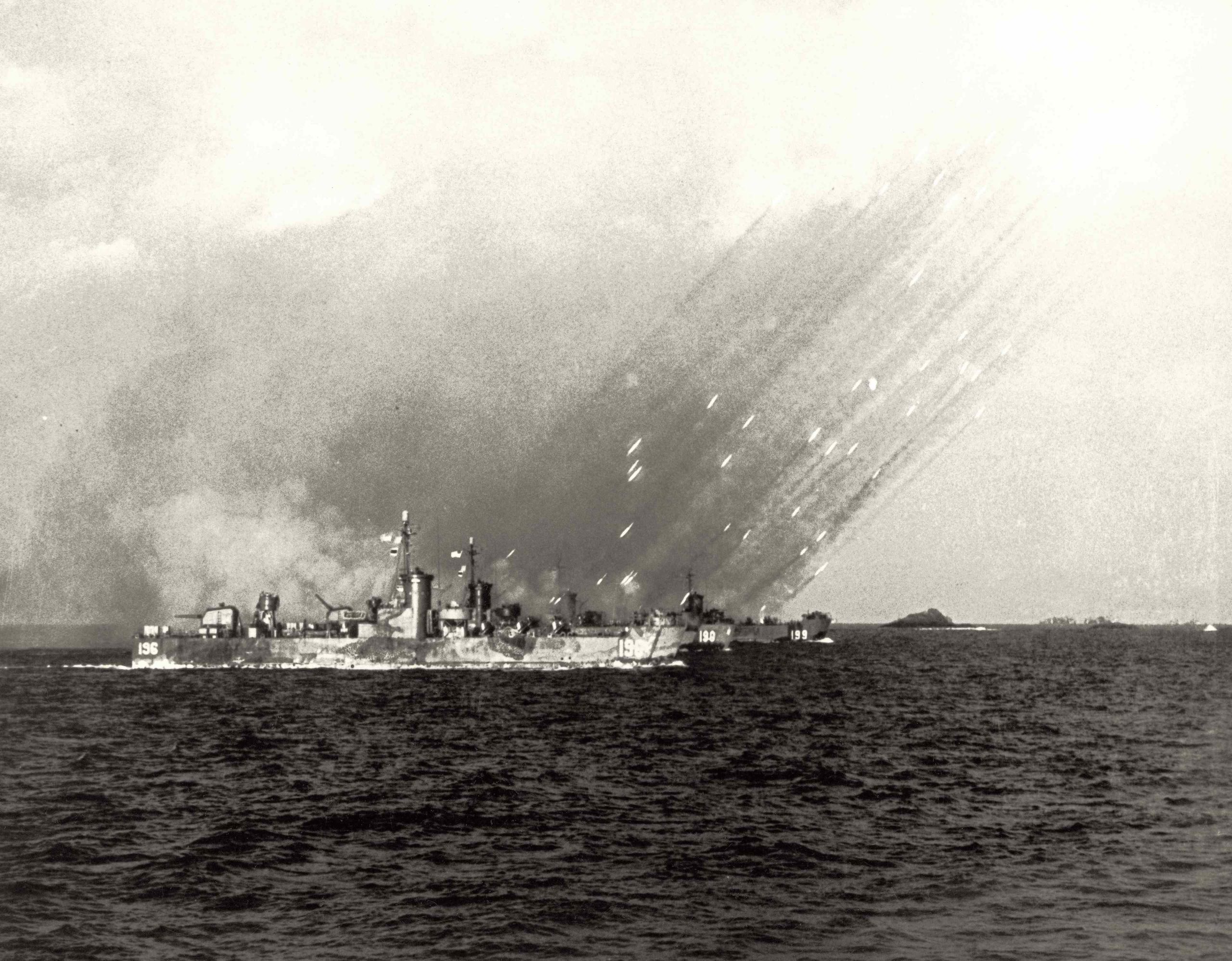 Black-and-white image of a military ship at sea from the "Himeyuri and Hawaii" exhibit.