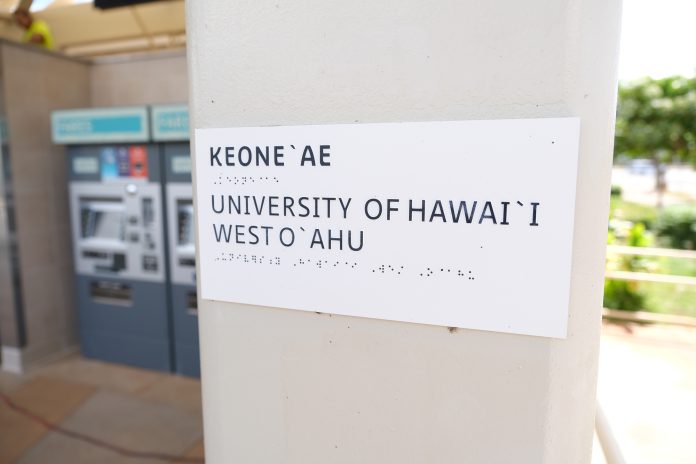 A close-up of the braille signage at the Keone‘ae (University of Hawaii–West Oahu) station.
