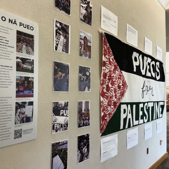 A display of photos and a banner.