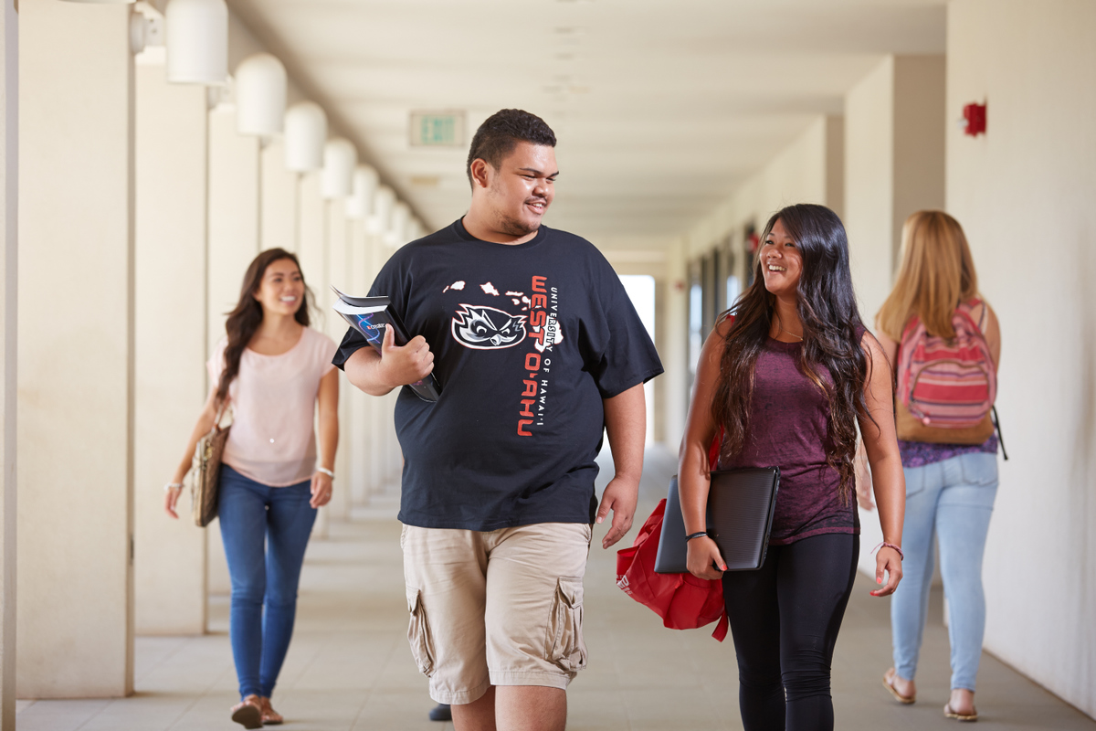 Students walking down hallway