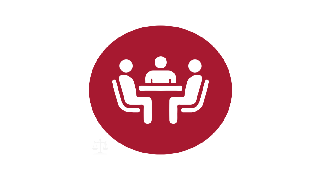 A red circle with a picture of three people sitting around a table.