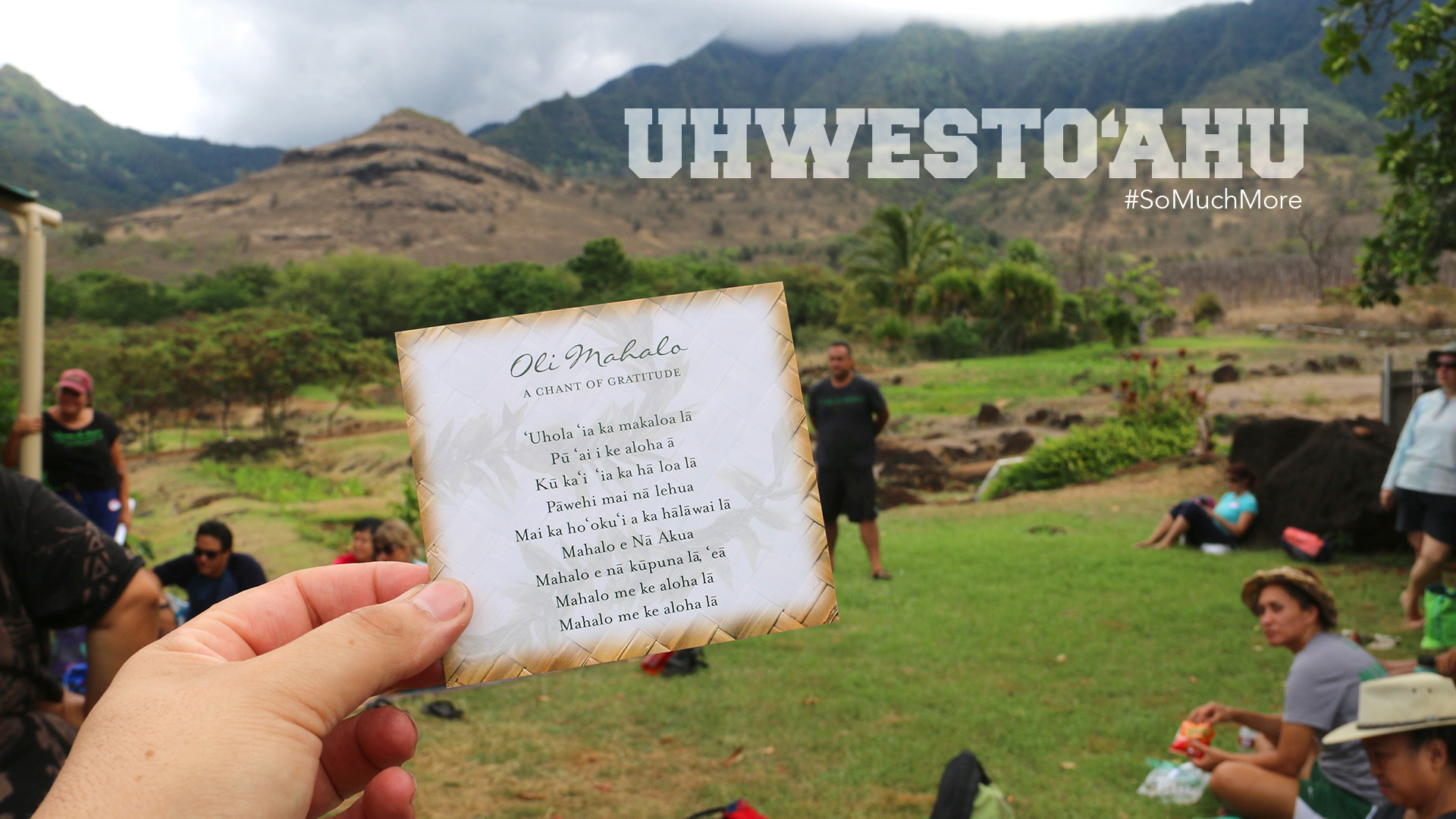 Close up of a card with the campus oli written on it while standing in Waianae Valley.